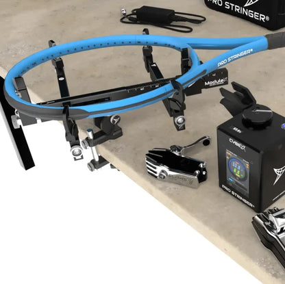racquet stringer and related equipment on a concrete surface