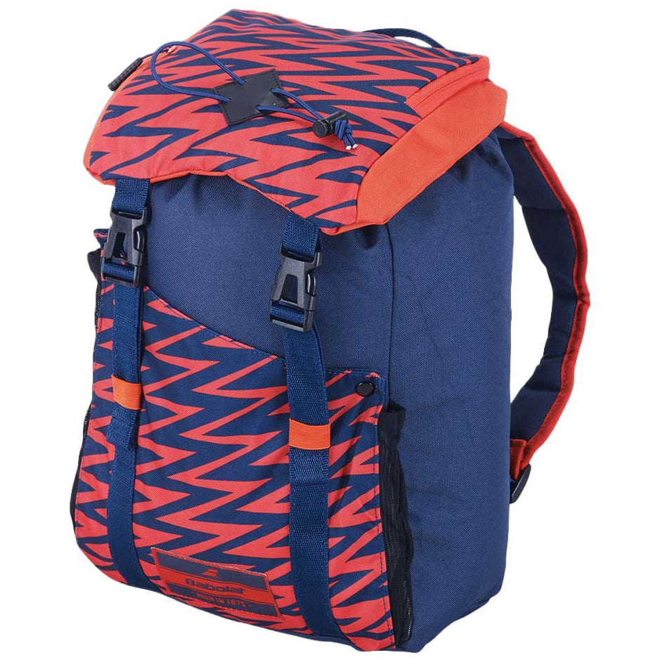 A blue and red patterned backpack with a navy blue body, red patterned flap, and red side straps, shown on a white background.