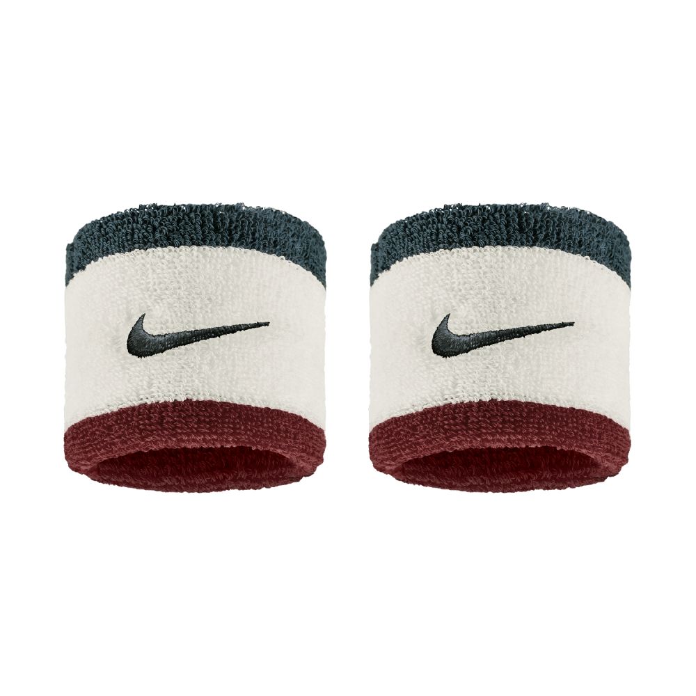 Pair of Nike wristbands with black swoosh logo on a white background